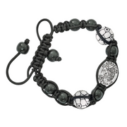 Black beaded bracelet with soccer ball charms on a white background
