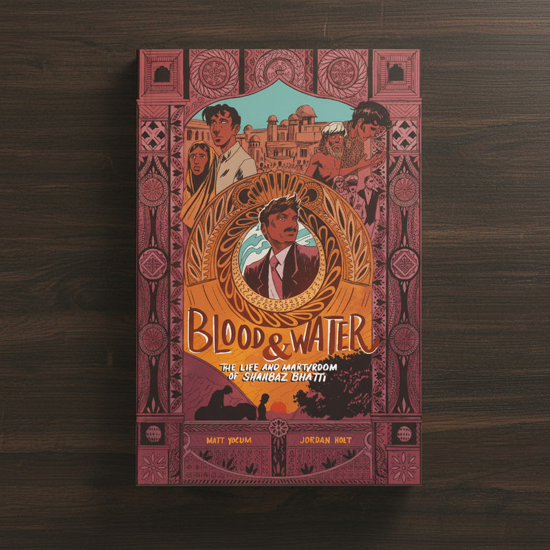 Book cover of 'Blood & Water' on a wooden surface