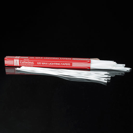 Pack of Cathedral Wax Lighting Tapers on a black background