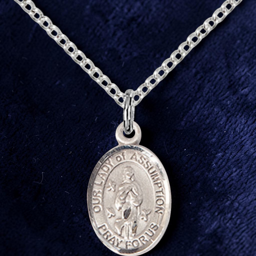 Silver 'Our Lady of Assumption' pendant on a chain against a dark blue background