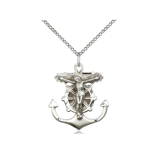 Silver pendant with anchor design and crucifixion figure on a white background
