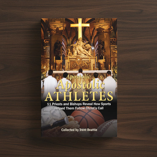 A book titled 'Apostolic Athletes' on a wood surface
