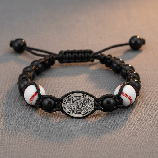 Bracelet with baseball beads and a central emblem on a textured surface