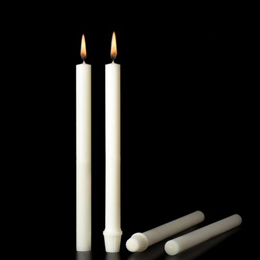 Two lit white candles with unlit candles on a black background