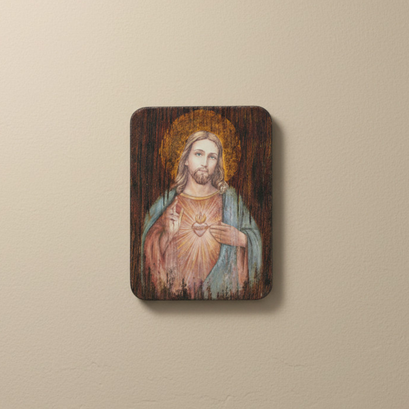 Wooden plaque with a painting of Jesus on a beige background
