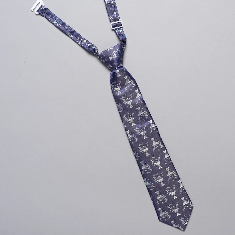 Navy blue tie with white pattern on a gray background