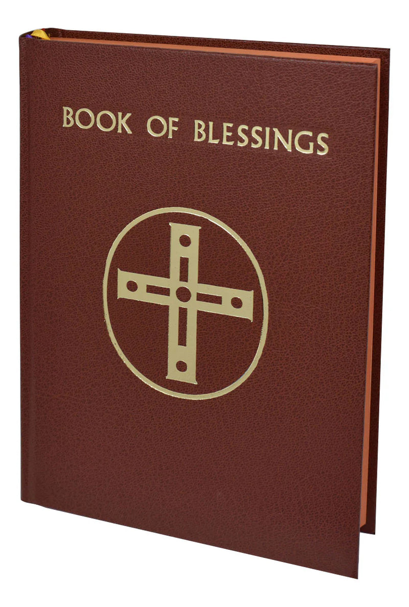 Brown 'Book of Blessings' with a gold cross symbol on a white background