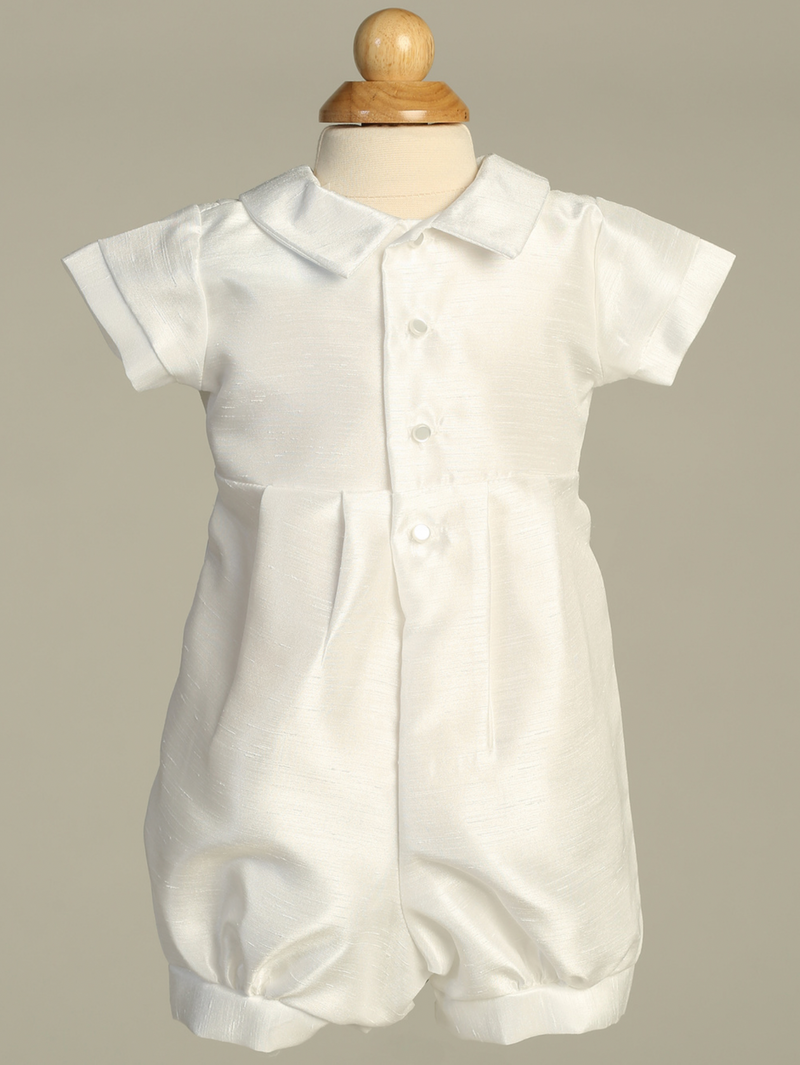 White baptism romper on a gray background
