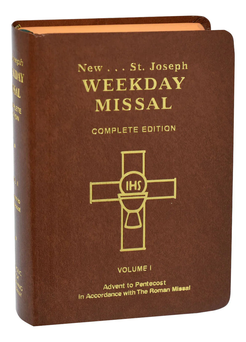 Brown book titled 'New St. Joseph Weekday Missal Complete Edition' with a gold cross on the cover.