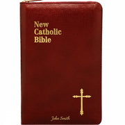 Red Bible with gold text and cross on a white background