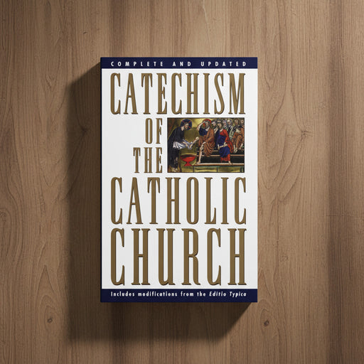 Book titled 'Catechism of the Catholic Church' on a wooden surface