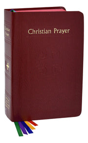 Maroon prayer book titled 'Christian Prayer' with colorful ribbons on a white background