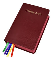 Maroon prayer book with colorful ribbons on a white background