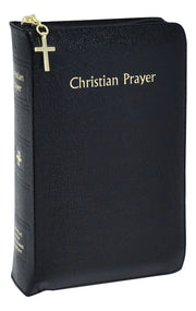 Black prayer book with gold cross and text on a white background