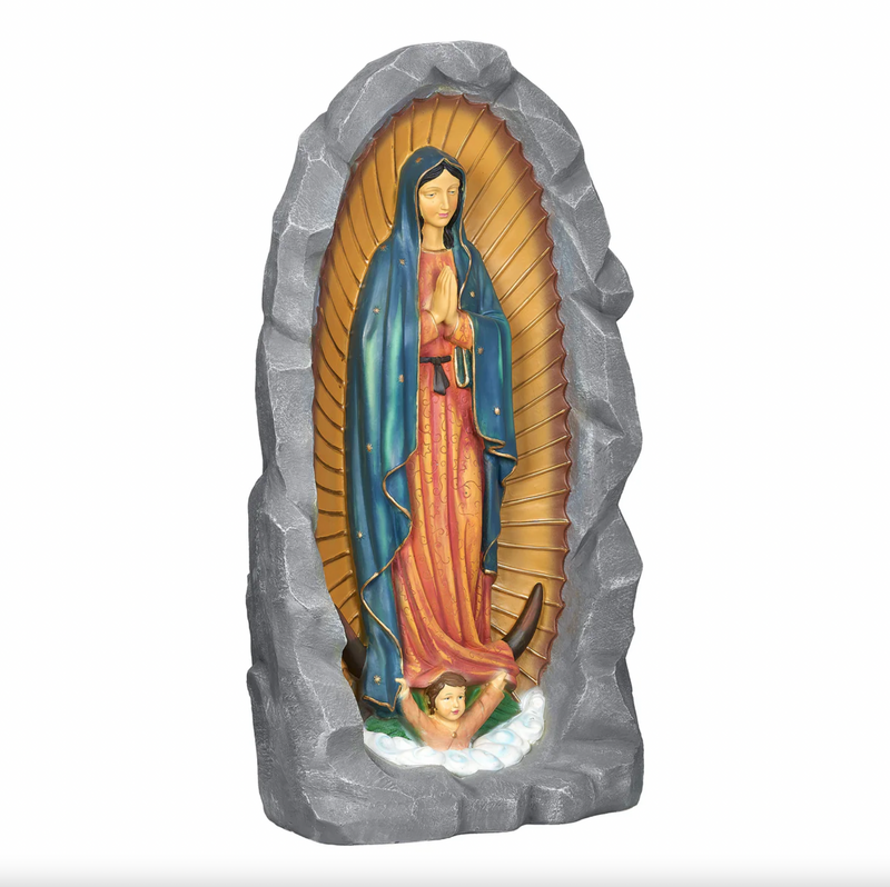 Statue of Our Lady of Guadalupe in a rocky arch on a white background
