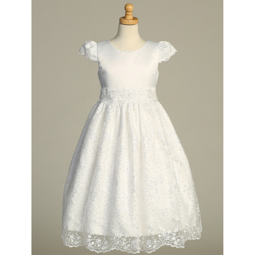 White lace dress on a mannequin against a gray background