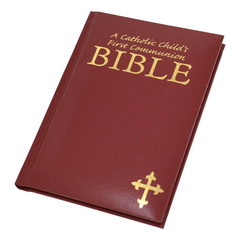 Red Bible for Catholic First Communion on a white background