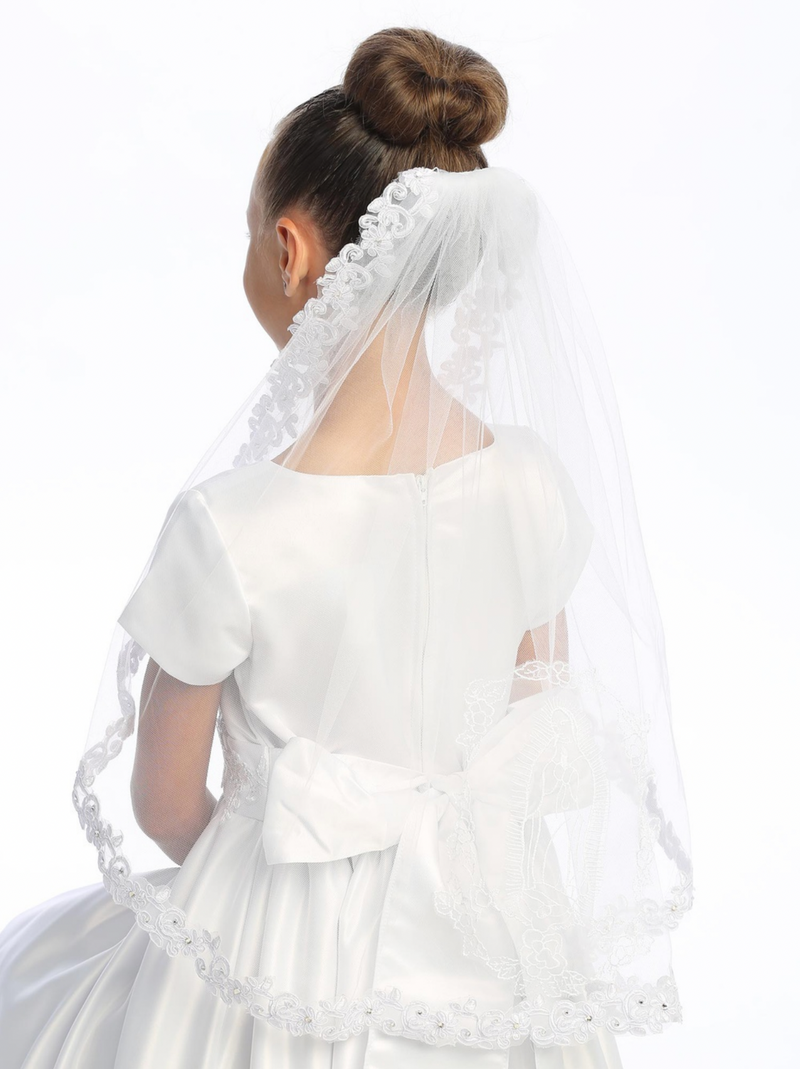 First Communion veil with corded lace trim, featuring an image of Our Lady of Guadalupe on the back.