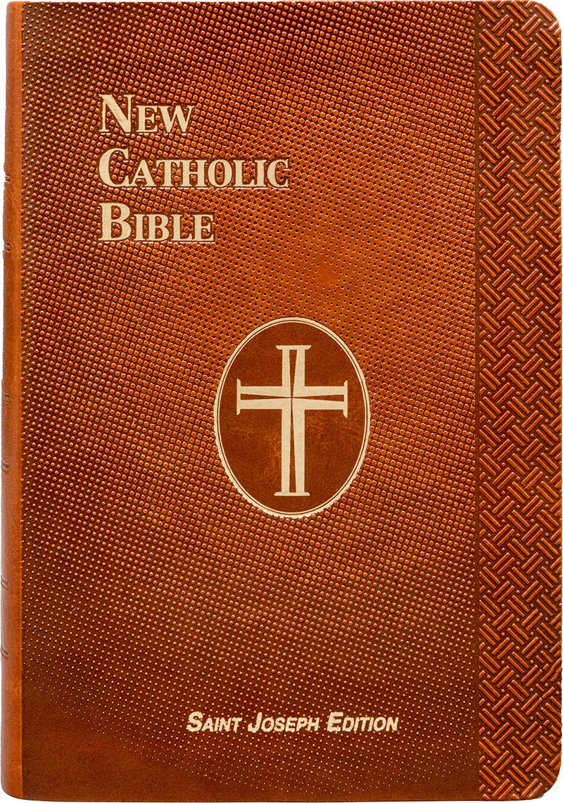 Brown leather-bound New Catholic Bible with cross emblem and text