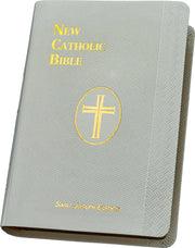 White Bible with gold text and cross emblem on a white background