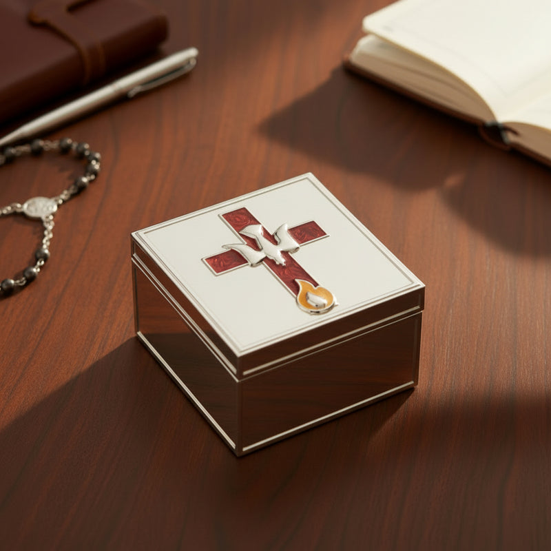 Hand opening a Confirmation jewelry box with a decorative cross emblem on a wooden surface.