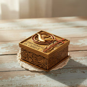Decorative Confirmation keepsake box with engraved Holy Spirit dove on a wooden surface