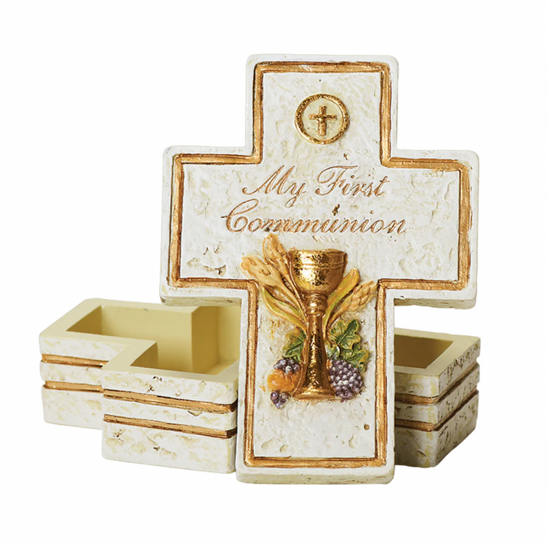 Decorative cross-shaped box with 'My First Communion' text and chalice design on a white background
