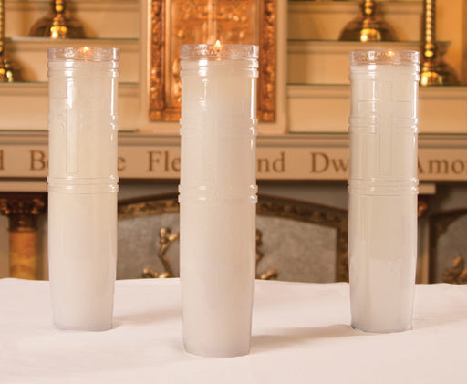 Three Dadant 540000 14-day sanctuary candles in clear plastic containers with cross designs on a church altar
