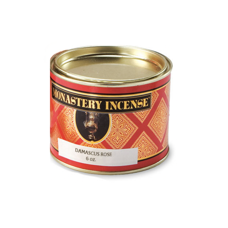 Red and orange tin of incense on a white background