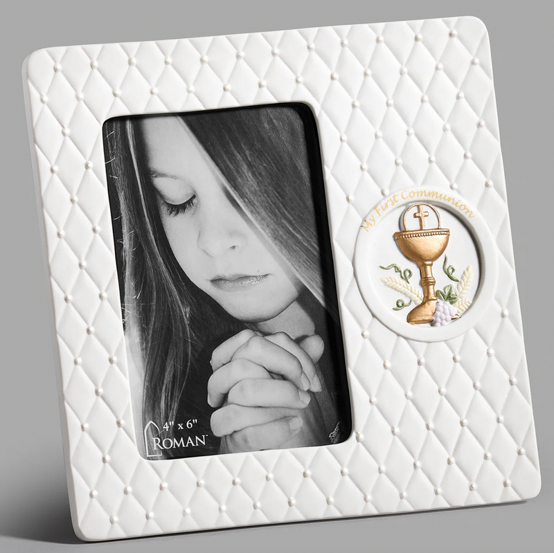 White porcelain First Communion picture frame with a gold-painted chalice emblem for a 4x6 inch photo.