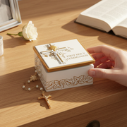 Decorative First Holy Communion keepsake box on a wooden surface