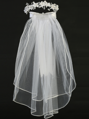 Full view of a little girl's rhinestone floral white sheer First Communion veil