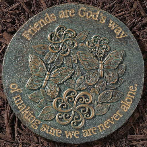 Decorative stone with butterfly and floral design and text on a textured surface