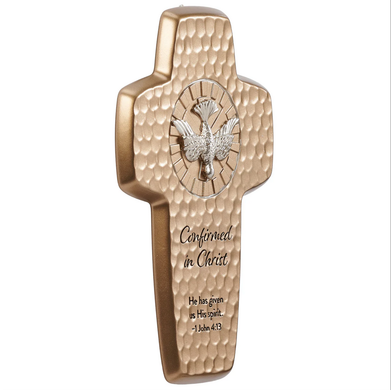Decorative cross with engraved text and a Holy Spirit dove emblem on a white background