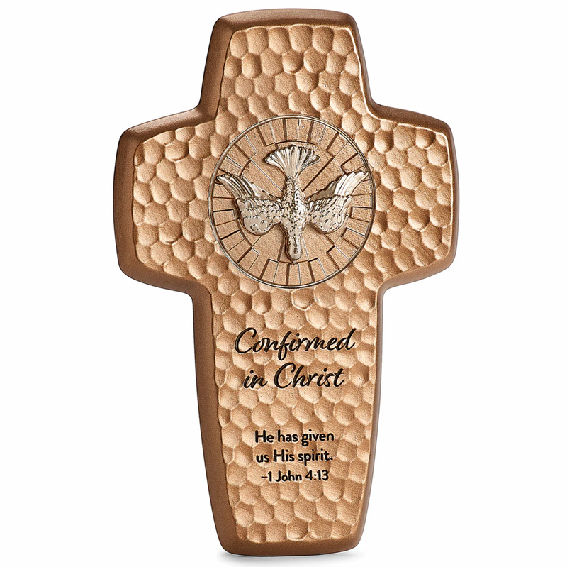 Decorative cross with engraved text and Holy Spirit dove emblem on a white background