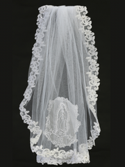 A white communion veil with corded lace trim, featuring an image of Our Lady of Guadalupe on the back.