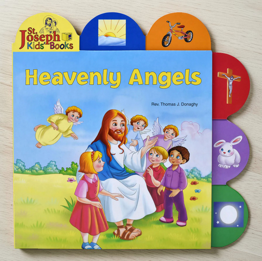 Children's book titled 'Heavenly Angels' by St. Joseph Kids Books on a wooden surface.