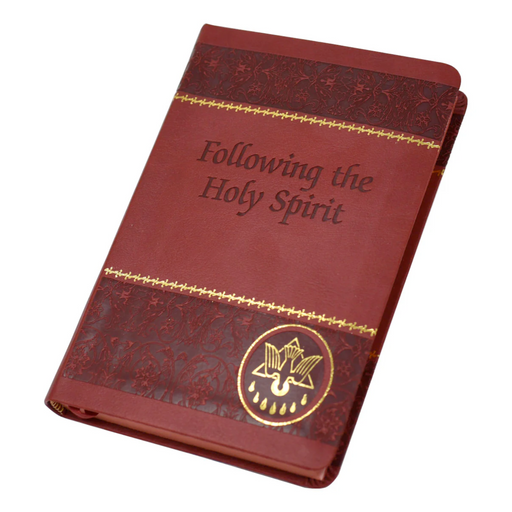 Red and gold foil prayer book on a white background.