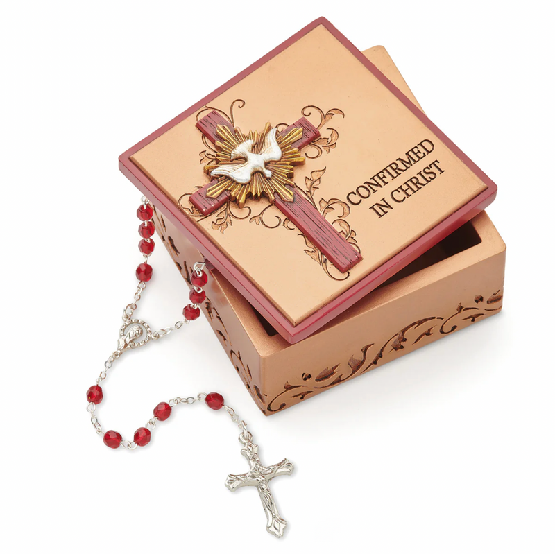 Decorative Confirmation keepsake box and rosary on a white background