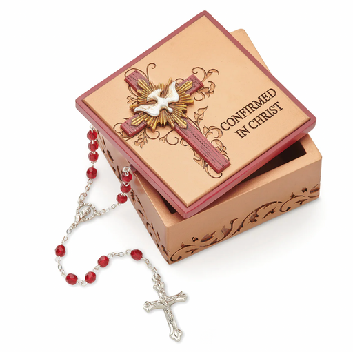 Decorative Confirmation keepsake box and rosary on a white background