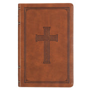Honey-brown faux leather Bible with a debossed cross on the cover and the spine labeled 'KING JAMES VERSION'. The Bible has a sturdy topstitched spine and appears to be a deluxe gift edition with thumb indexing and a satin ribbon marker.