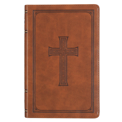 Honey-brown faux leather Bible with a debossed cross on the cover and the spine labeled 'KING JAMES VERSION'. The Bible has a sturdy topstitched spine and appears to be a deluxe gift edition with thumb indexing and a satin ribbon marker.