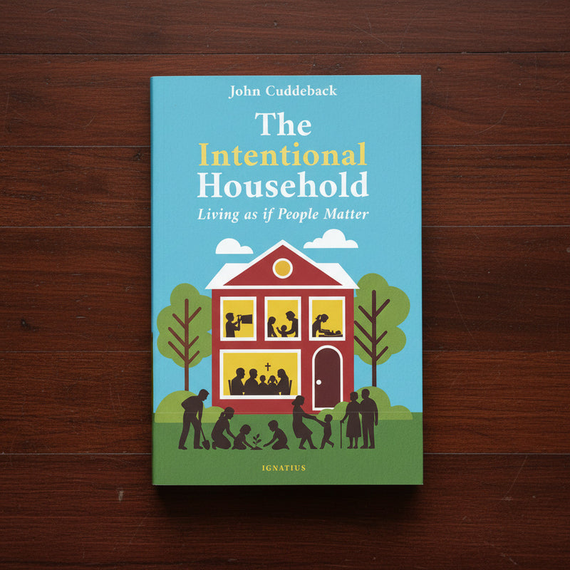 Book cover of 'The Intentional Household' on a wooden surface