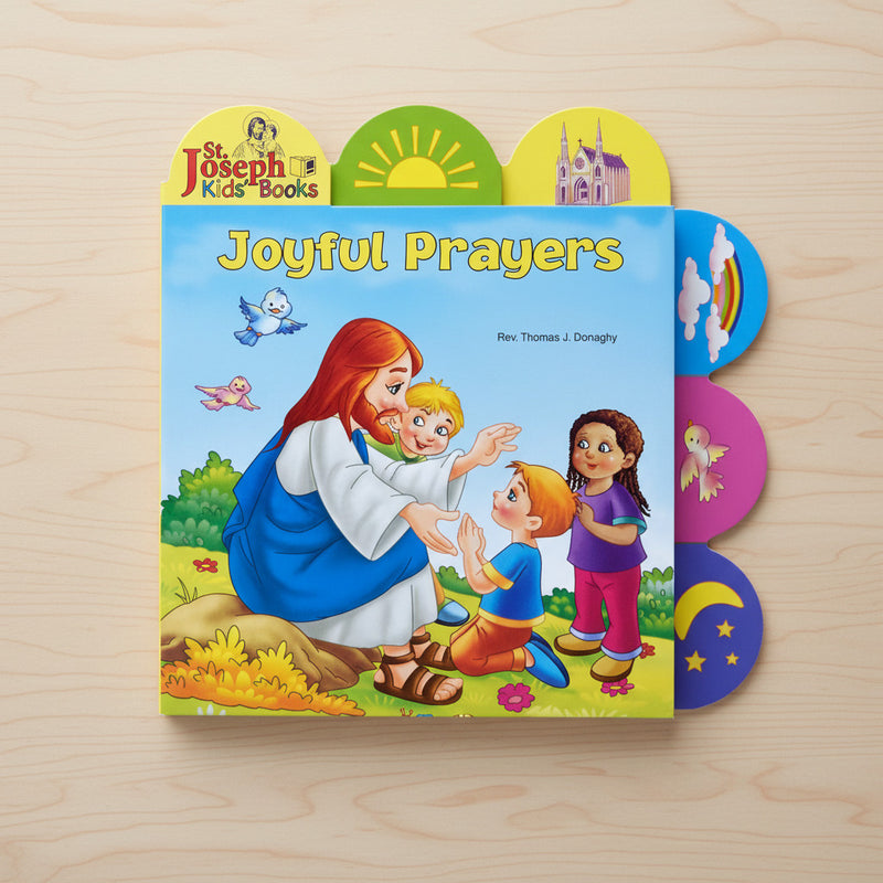 Book titled 'Joyful Prayers' by St. Joseph Kids' Books on a wooden surface