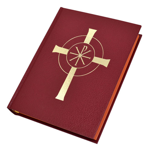 Red liturgical book with a gold cross on a white background