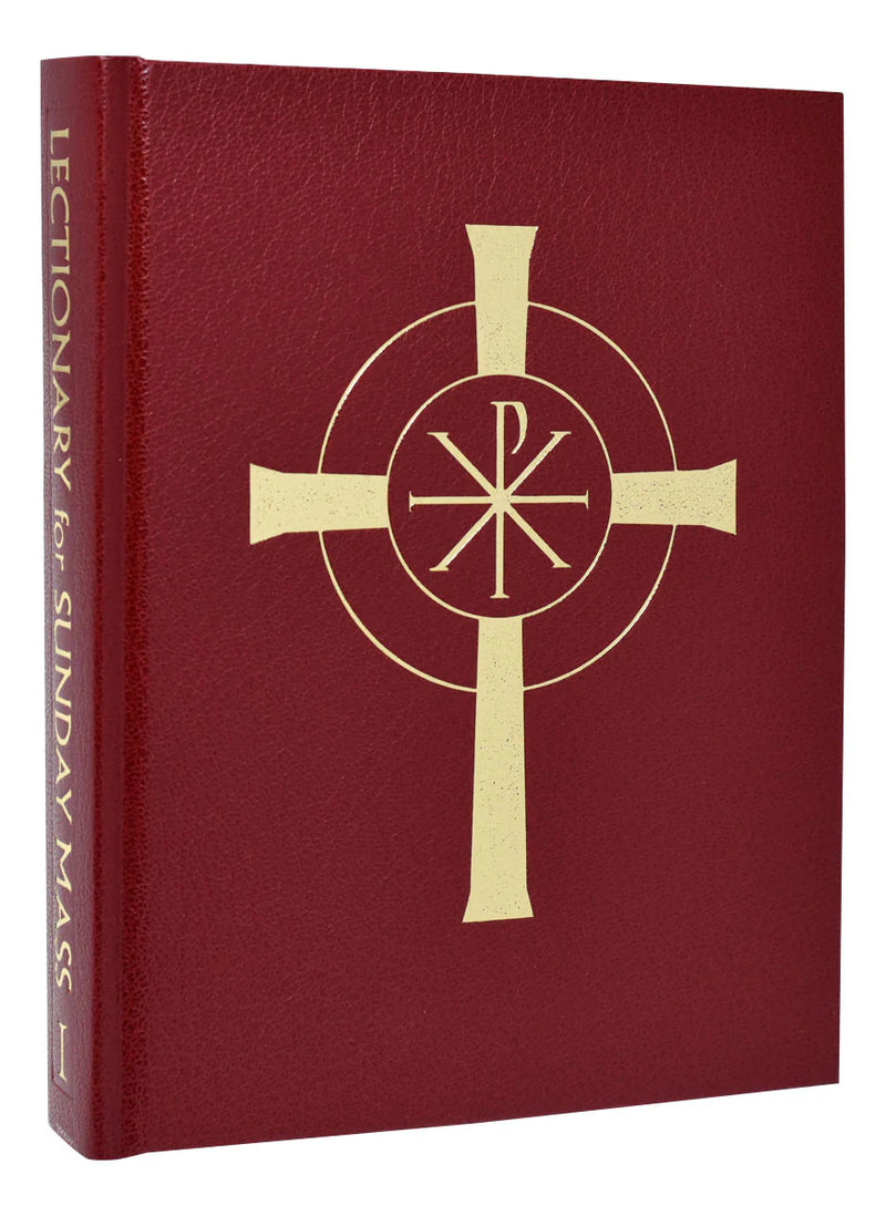 Red liturgical book with a gold cross on a white background