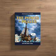 Book titled 'The Power of Prayer' on a wooden surface