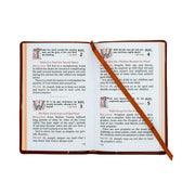 Open book with text and a red cross overlay on a white background
