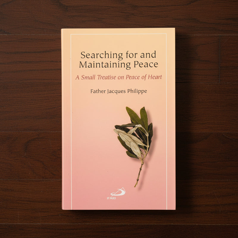 Book titled 'Searching for and Maintaining Peace' on a wooden surface