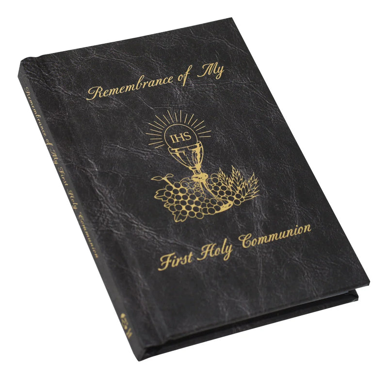 Black book with gold text and design, titled 'Remembrance of My First Holy Communion'.
